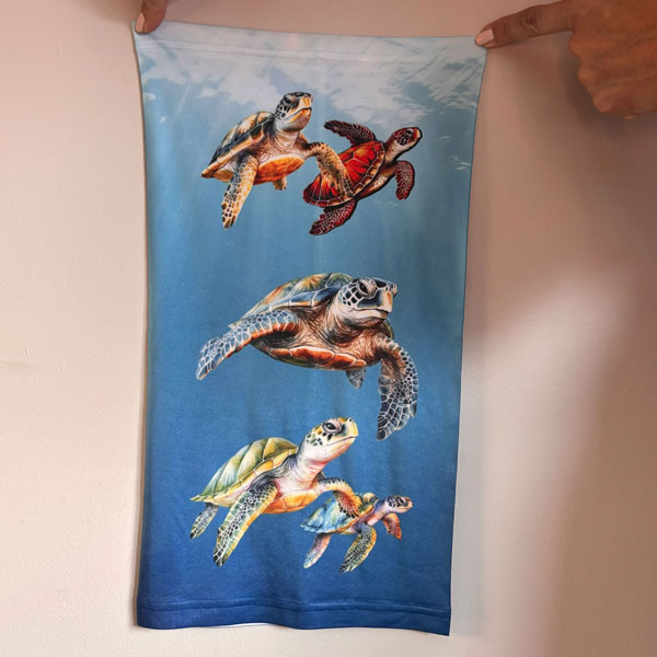 Neck gaiter featuring turtles
