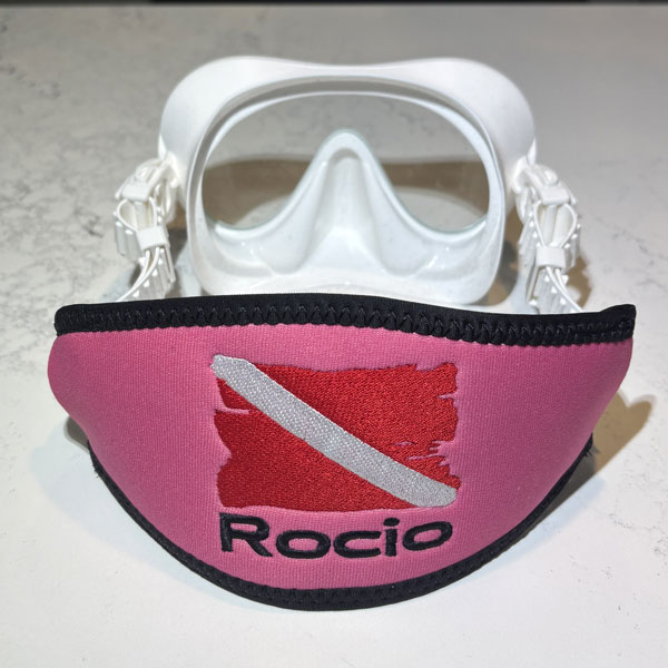 Pink scuba mask strap with a diver down flag