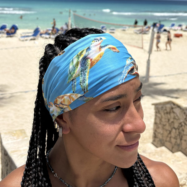 Blue neck gaiter featuring turtles