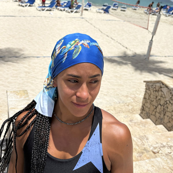 Blue neck gaiter featuring turtles
