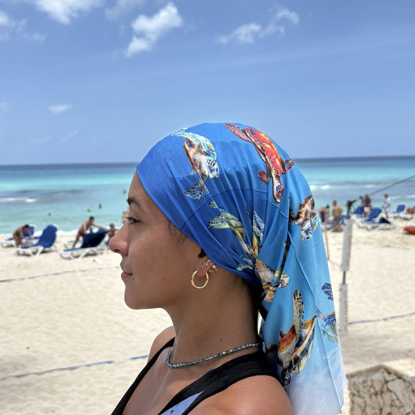 Blue neck gaiter featuring turtles